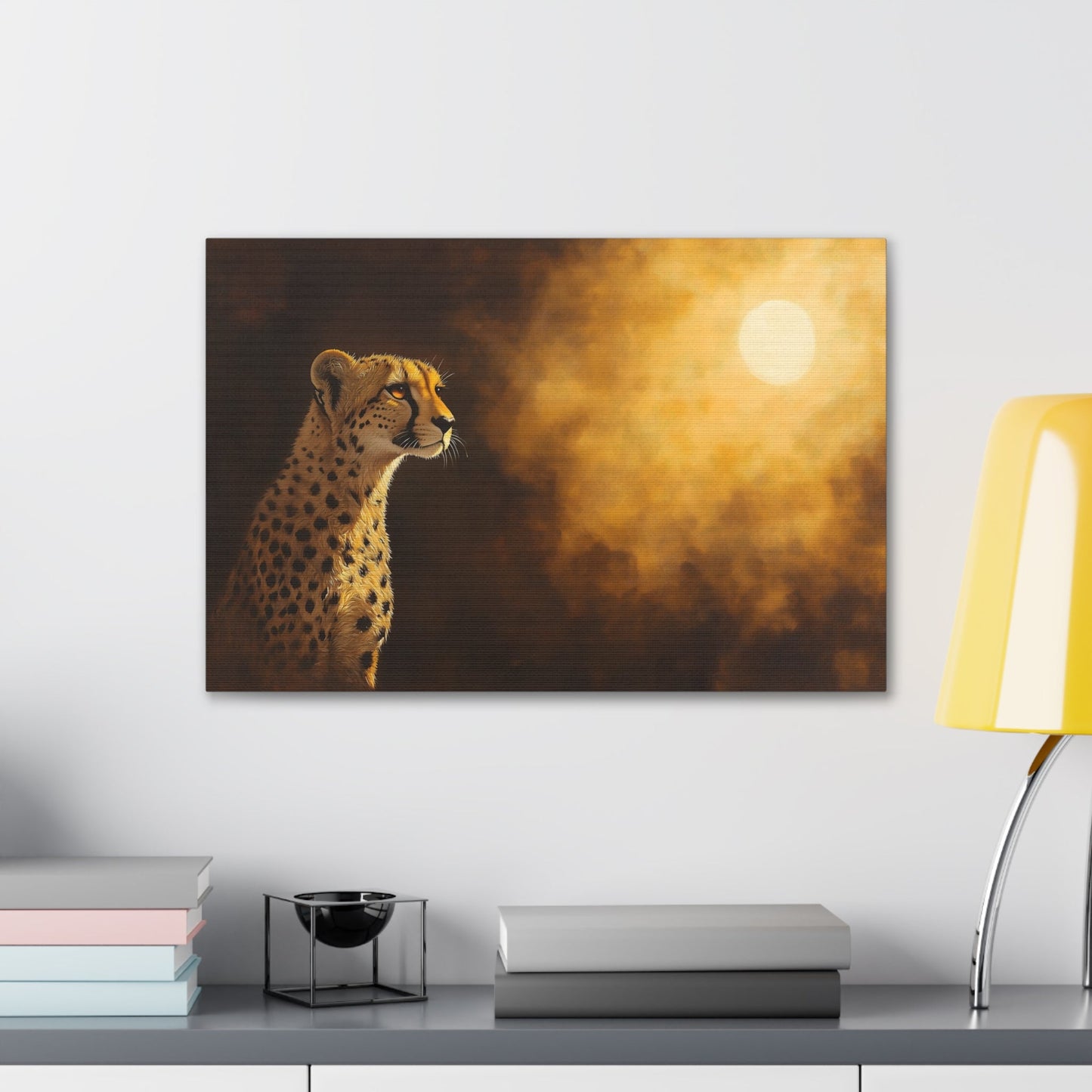 Horizontal-oriented wall art: "Shadowed Speed III" A cheetah gazes into the distance, bathed in the warm glow of a mysterious light source against a softly lit, golden background. The detailed fur and majestic pose are highlighted by dramatic shadows, capturing the animal's grace and strength in a serene moment.