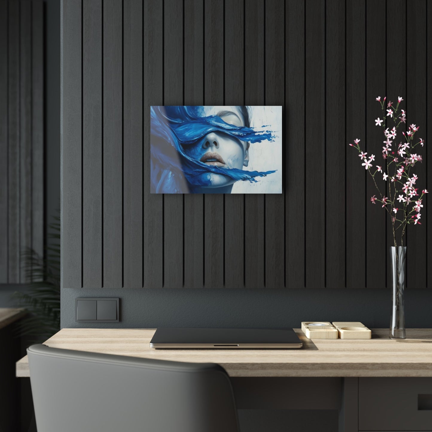 Horizontal-oriented wall art "Tides of the Mind" A surreal portrait of a woman's face partially obscured by flowing waves of cobalt blue paint. The image evokes a sense of introspection and calm, blending realistic features with abstract, fluid movement.