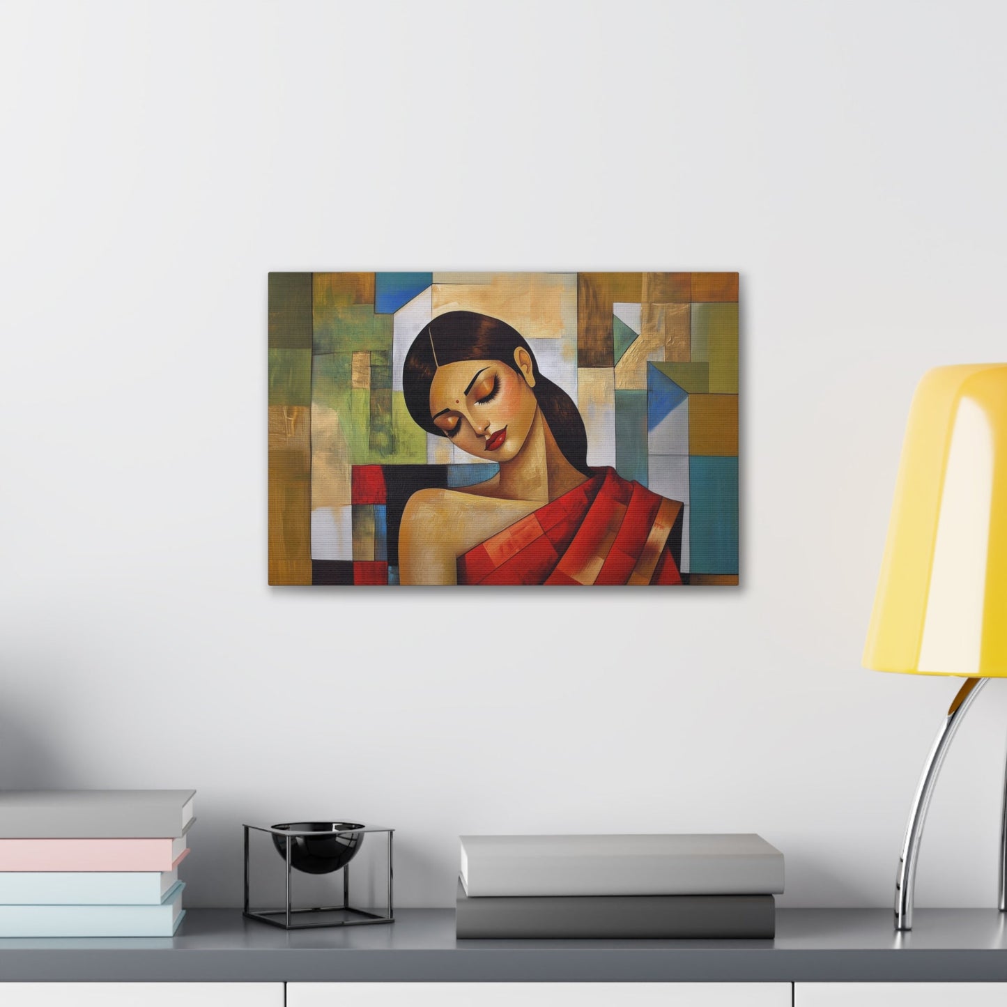 Horizontal-oriented wall art: "Fractured Grace." An Indian woman in traditional attire is depicted in a Cubist style, her contemplative expression framed by geometric shapes and bold colors of red, green, and gold. The textured background and soft dramatic lighting create an elegant and serene composition.