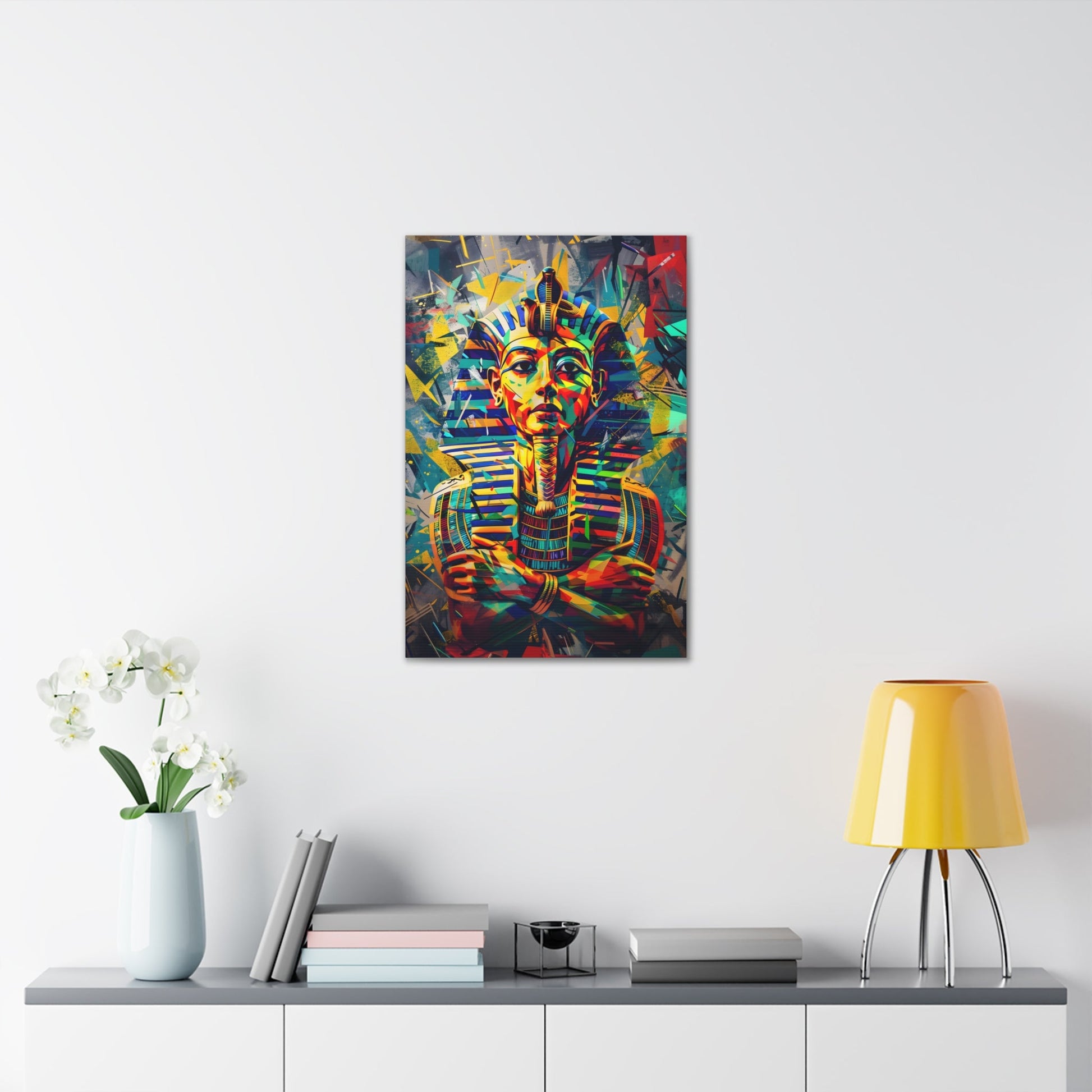 Vertical-oriented wall art: A regal portrait of King Tutankhamun, depicted with a golden headdress and adorned with ornate jewelry, exuding an aura of majesty and power.