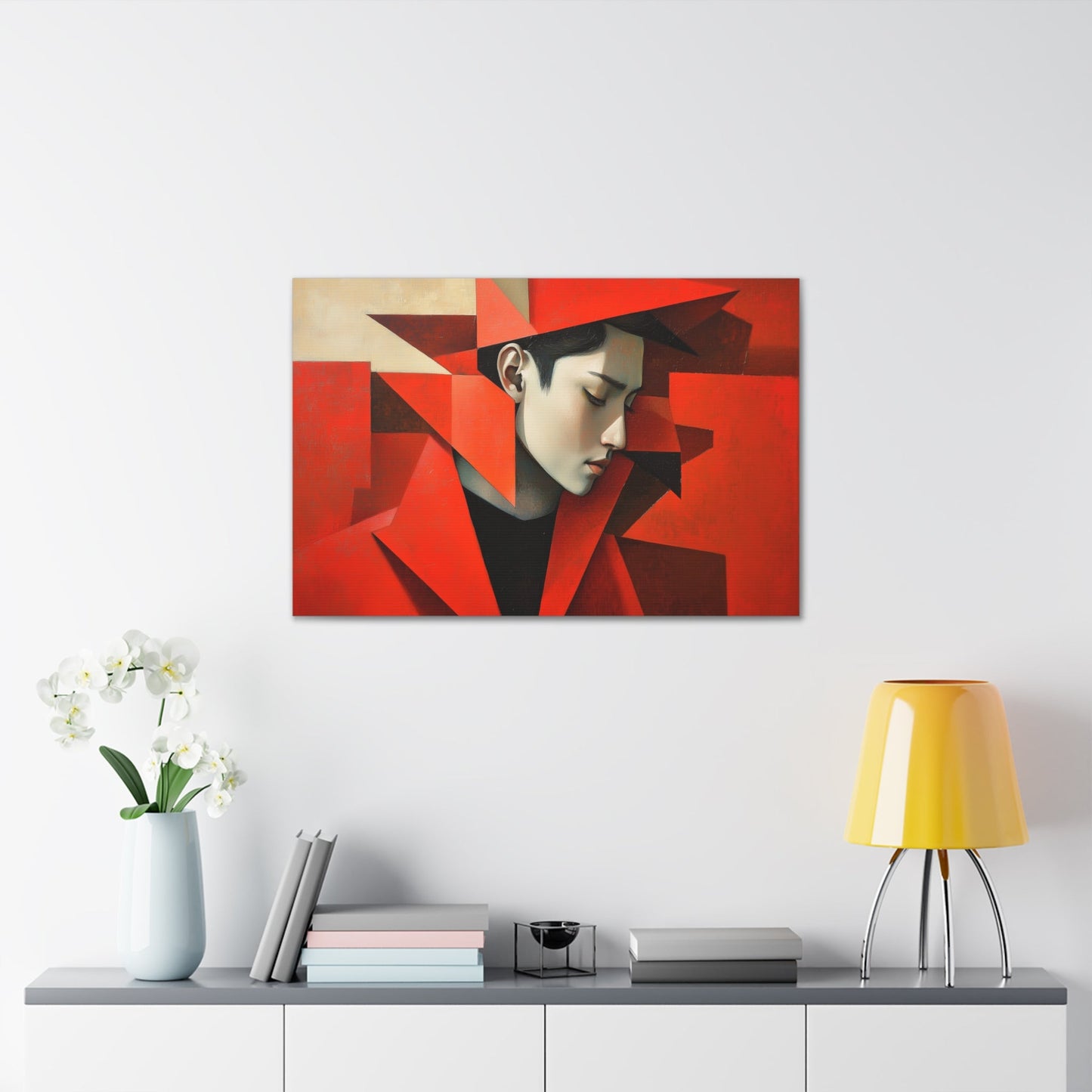 Horizontal-oriented wall art: "Refined in Fragments." A high-fashion Asian male is depicted in a Cubist style, with bold angular red geometric shapes framing his contemplative profile. The soft dramatic lighting contrasts with vivid red tones, creating an expressive and sophisticated composition.