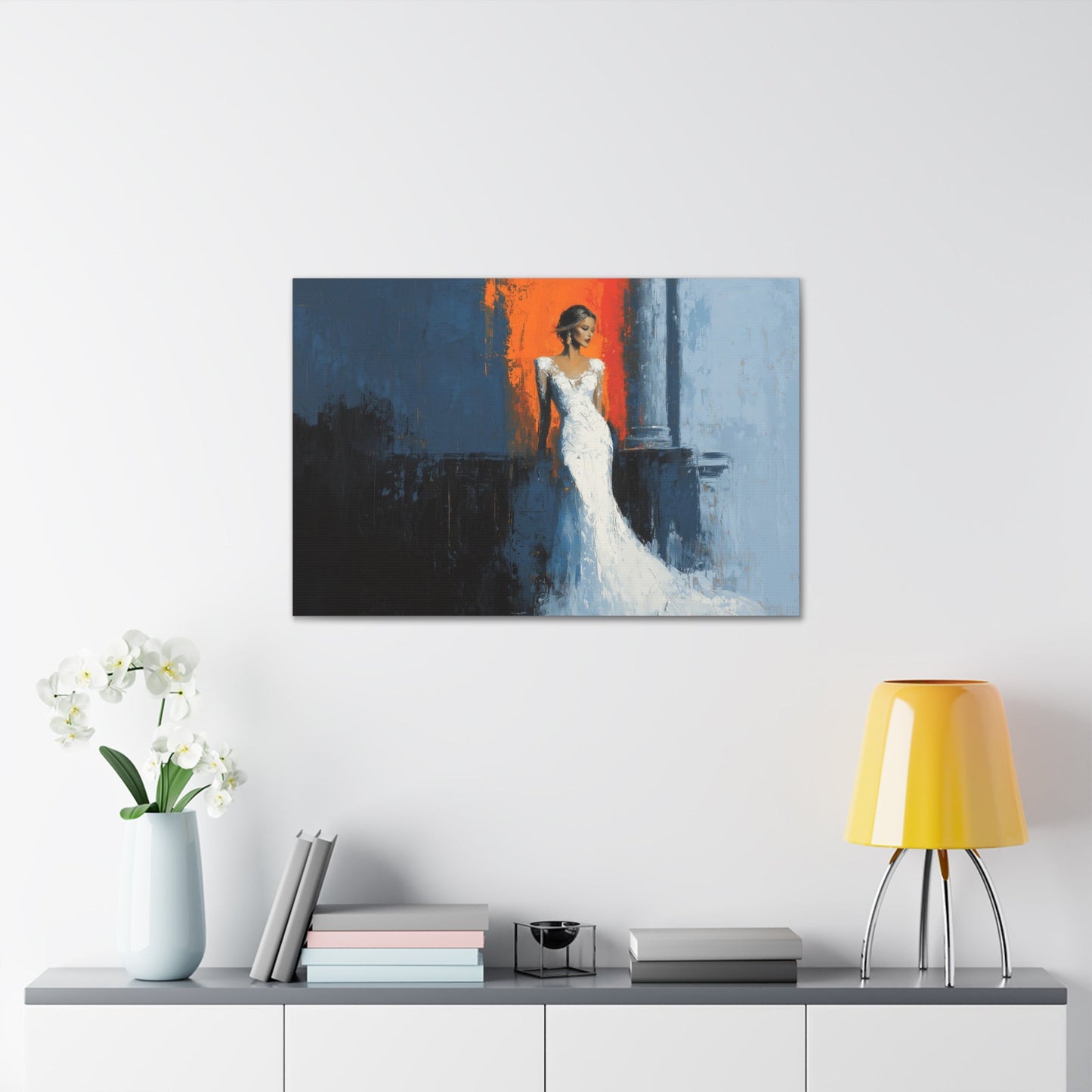 Horizontal-oriented wall art: "Ivory Vision." A poised woman stands gracefully in an ivory gown, illuminated by warm light against a vibrant orange and cool blue background. The palette knife painting technique enhances the textured details, evoking elegance and serenity.