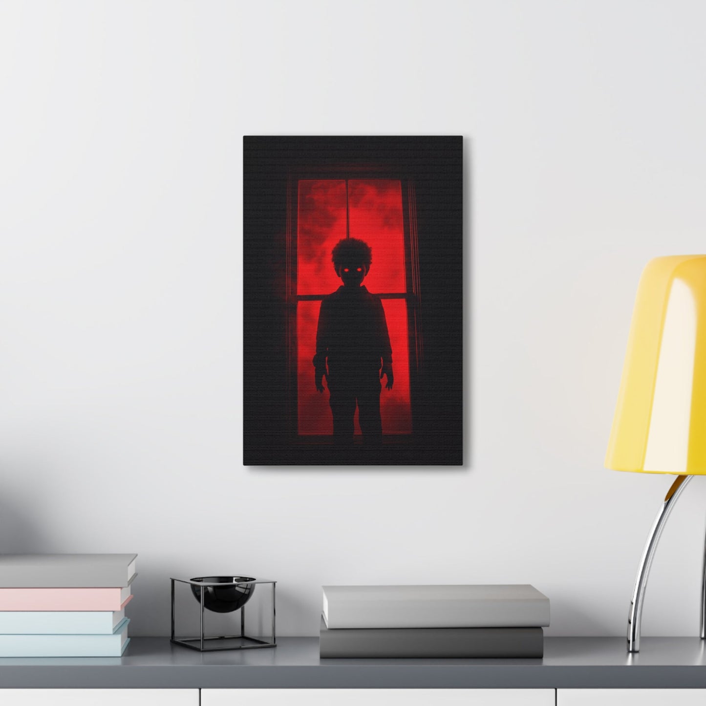 Vertical-oriented wall art: "Shadows in the Mist II." A shadowy child-like figure with glowing red eyes stands against a crimson-illuminated window, shrouded in red mist and black silhouettes, evoking an eerie and supernatural atmosphere.