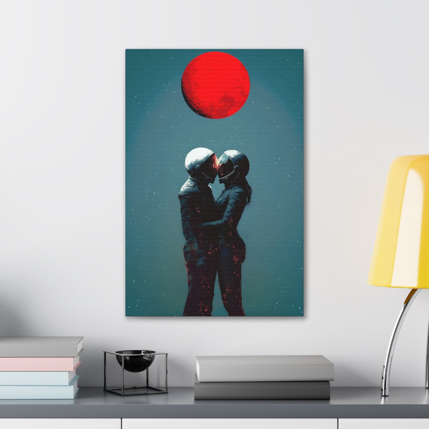 Vertical-oriented wall art: "Galactic Romance IV" depicts two astronauts embracing under a glowing red moon, their helmets gently touching as they share a moment of intimacy in space. The starry background contrasts with the fiery red moon, emphasizing the romantic and cosmic connection between the figures.