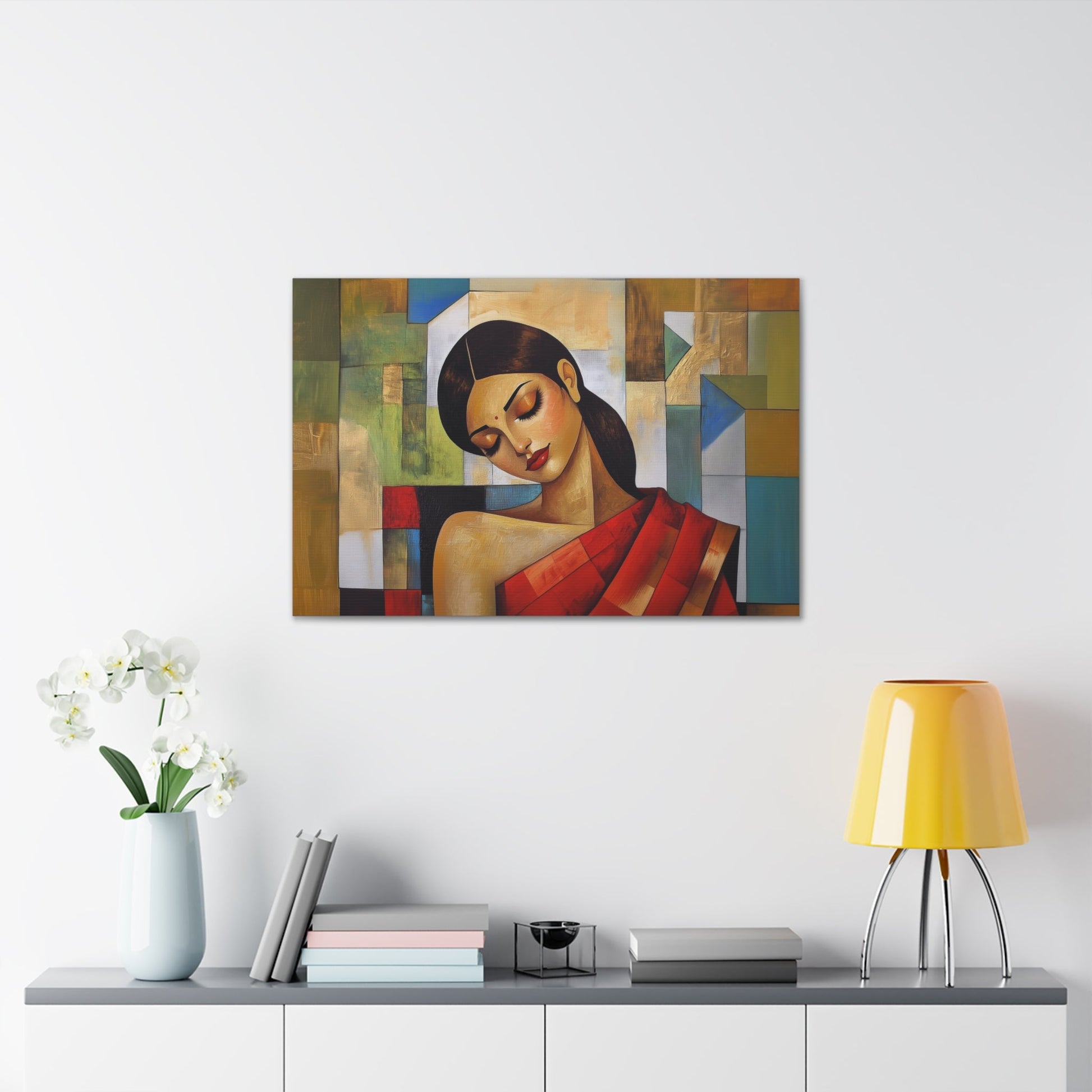 Horizontal-oriented wall art: "Fractured Grace." An Indian woman in traditional attire is depicted in a Cubist style, her contemplative expression framed by geometric shapes and bold colors of red, green, and gold. The textured background and soft dramatic lighting create an elegant and serene composition.