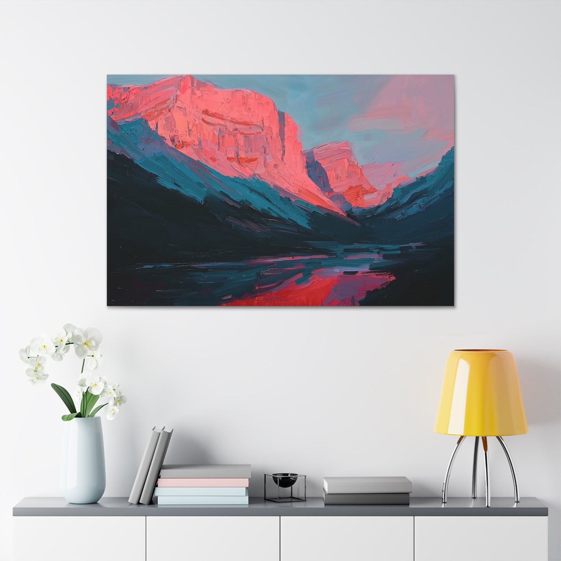 Horizontal-oriented wall art: "Timeless Peaks" Landscape artwork titled Timeless Peaks from the Bold Horizons collection, featuring vibrant crimson and pink mountains reflected in a tranquil lake. The piece highlights bold brushstrokes and a dynamic interplay of warm and cool colors, evoking majesty and serenity.