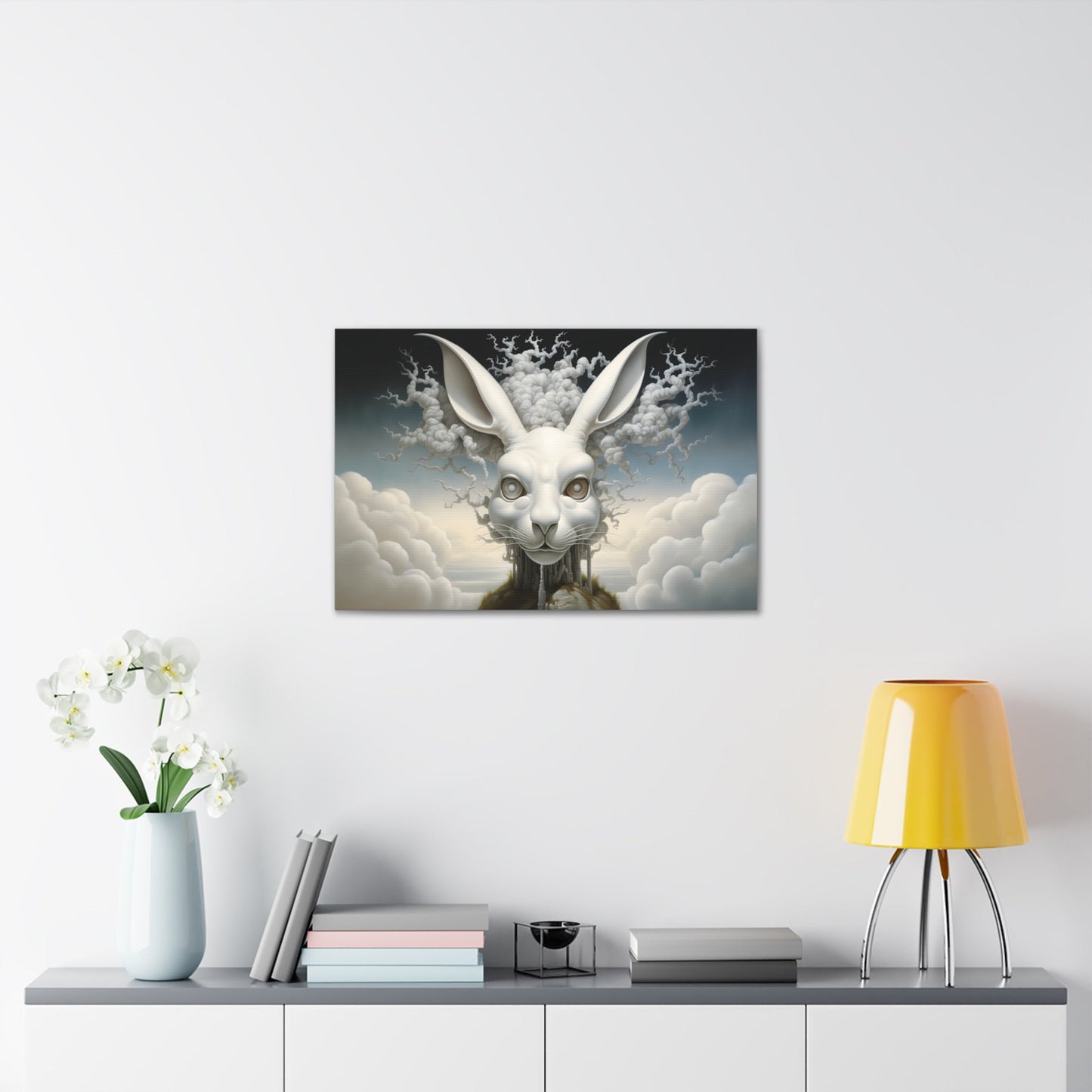 Horizontal-oriented wall art: A surreal, oversized white hare with mechanical eyes is depicted in the center, surrounded by swirling cloud-like forms. The background features a dreamy, ethereal landscape with hints of industrial architecture, blending natural and abstract elements.