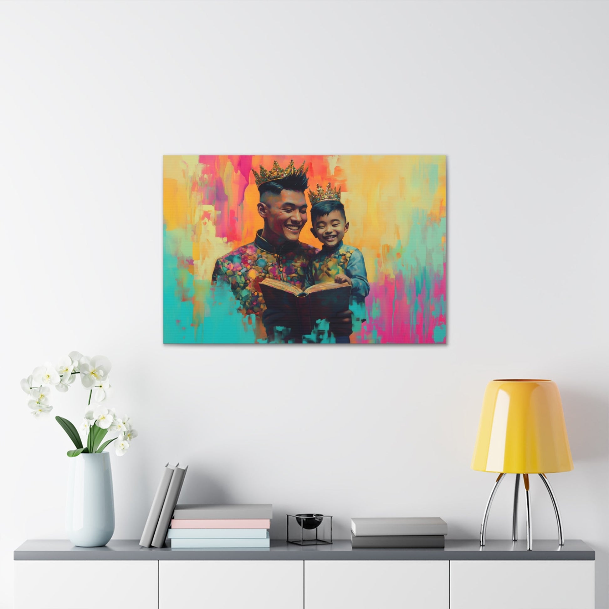 Horizontal-Oriented wall art: "Crowning Knowledge V" depicts a joyful father and son wearing golden crowns, smiling as they share a moment of reading together against a vibrant, abstract background of pinks, oranges, and blues. The artwork blends detailed portraiture with a playful, colorful backdrop, capturing the warmth and happiness of family bonds.