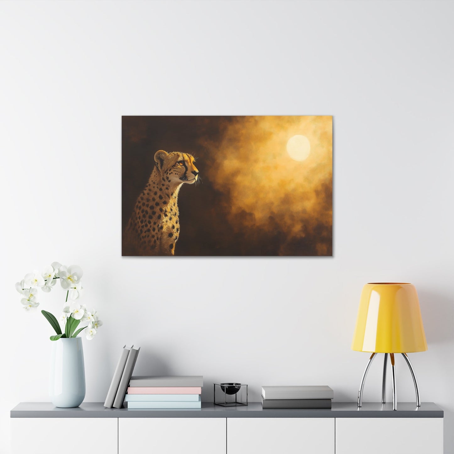 Horizontal-oriented wall art: "Shadowed Speed III" A cheetah gazes into the distance, bathed in the warm glow of a mysterious light source against a softly lit, golden background. The detailed fur and majestic pose are highlighted by dramatic shadows, capturing the animal's grace and strength in a serene moment.