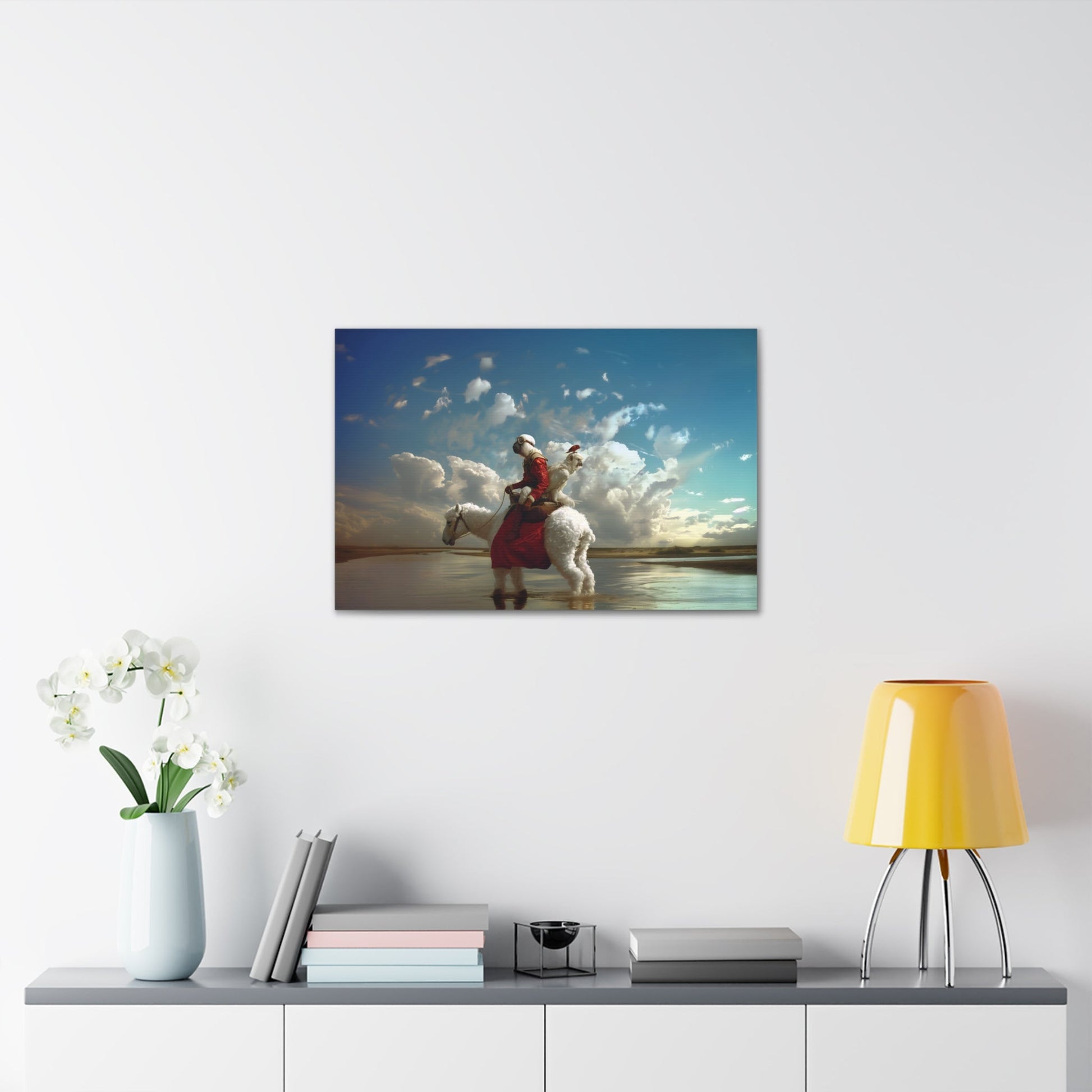 Horizontal-oriented wall art: A surreal photorealistic artwork featuring a monkey dressed in a red top and brown boots riding a white alpaca through shallow water in the desert. The monkey is accompanied by a red bird and a white parrot, all under a cloudy blue sky.