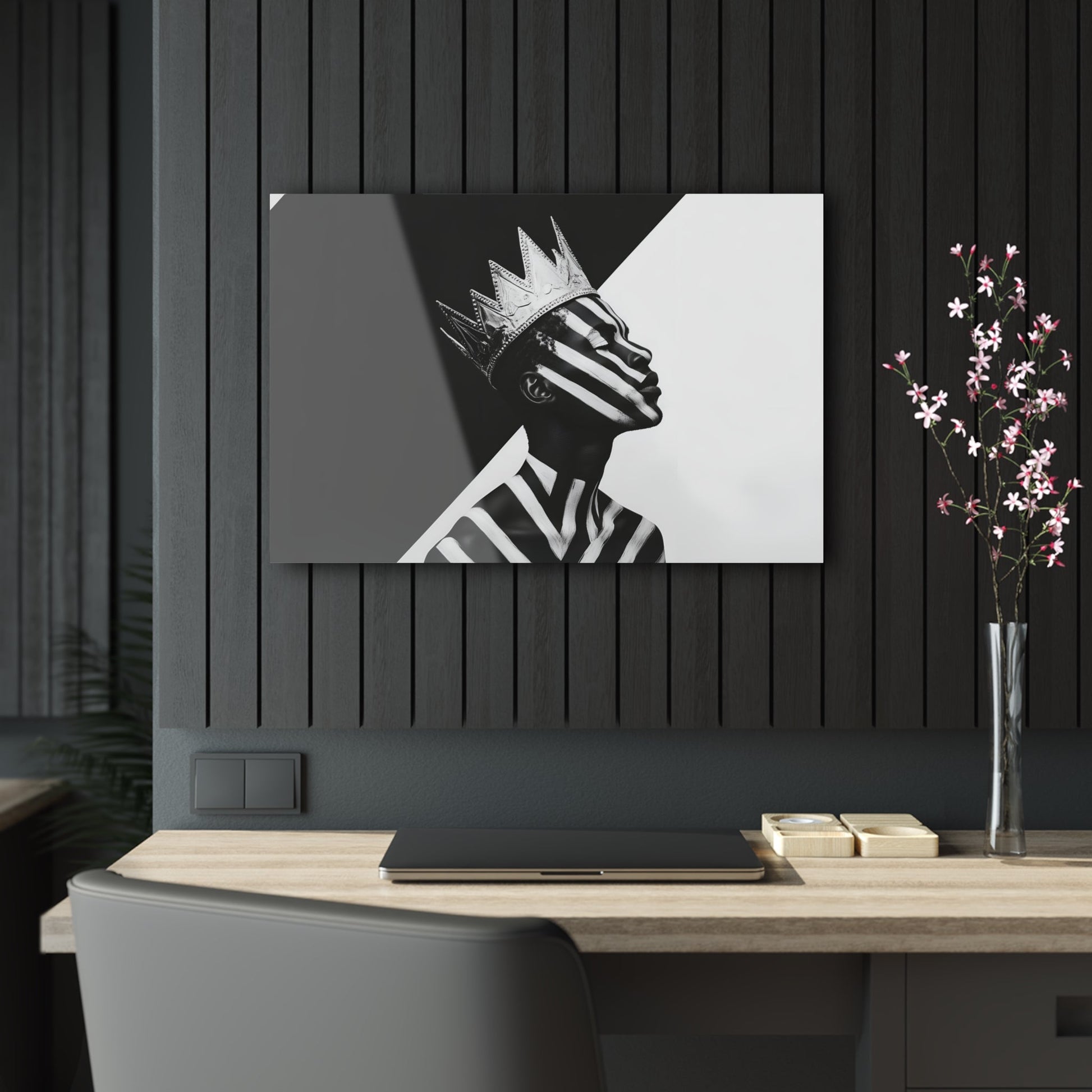 Horizontal-oriented wall art: "Crown of Dignity V" A black-and-white abstract portrait of a Black man wearing a metallic crown, his face and body adorned with bold, geometric stripes. The striking contrast and minimalist design emphasize his regal presence and dignified expression against a stark background.