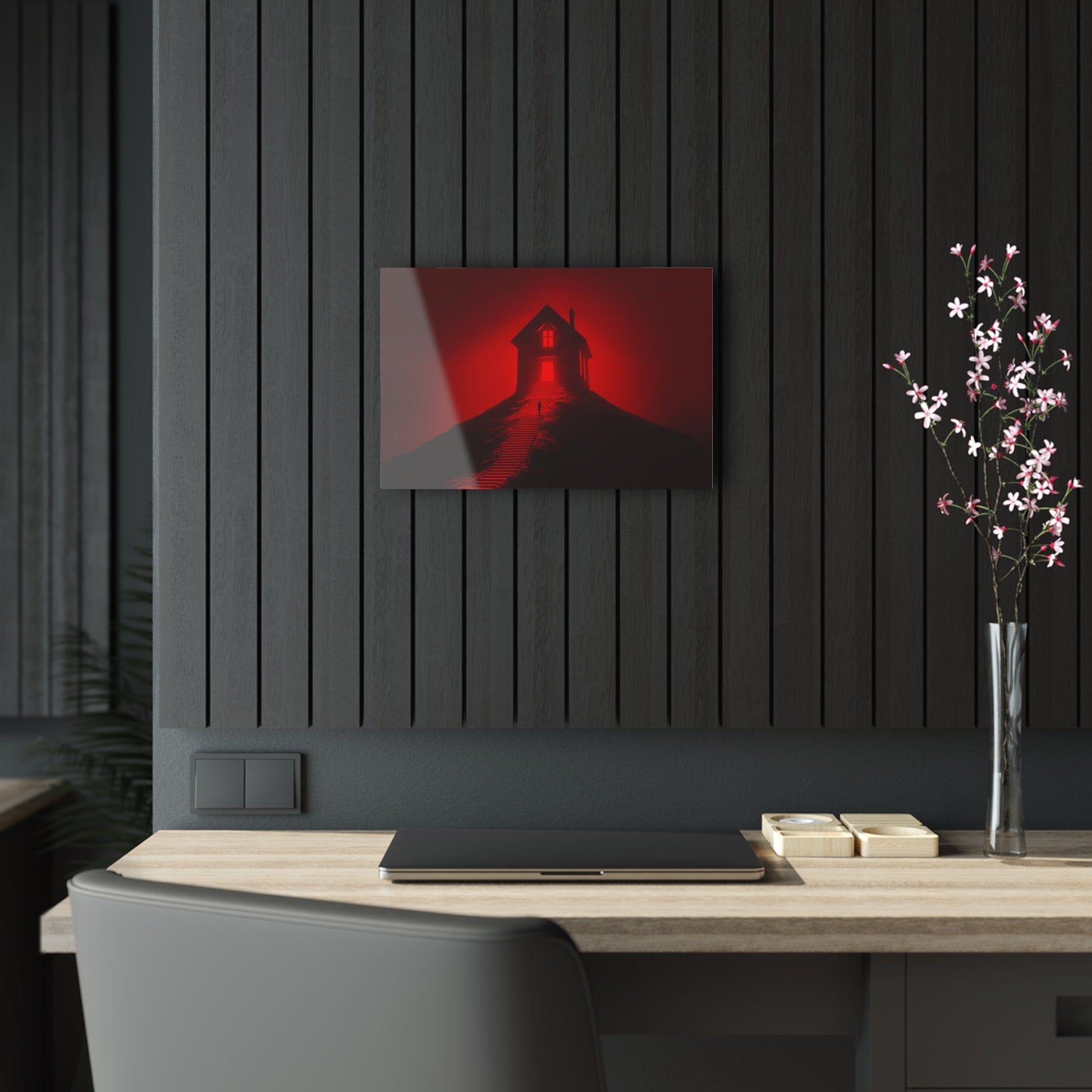 Horizontal-oriented wall art: Artwork titled Crimson Ascent from the Ruby Realms collection, featuring a glowing red house atop a hill with a solitary figure ascending a shadowed staircase. The piece creates an eerie and surreal atmosphere with its intense red glow and dramatic contrast.