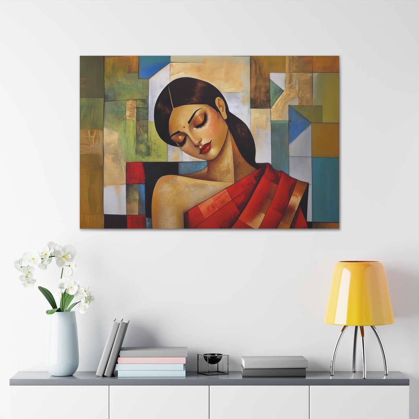 Horizontal-oriented wall art: "Fractured Grace." An Indian woman in traditional attire is depicted in a Cubist style, her contemplative expression framed by geometric shapes and bold colors of red, green, and gold. The textured background and soft dramatic lighting create an elegant and serene composition.