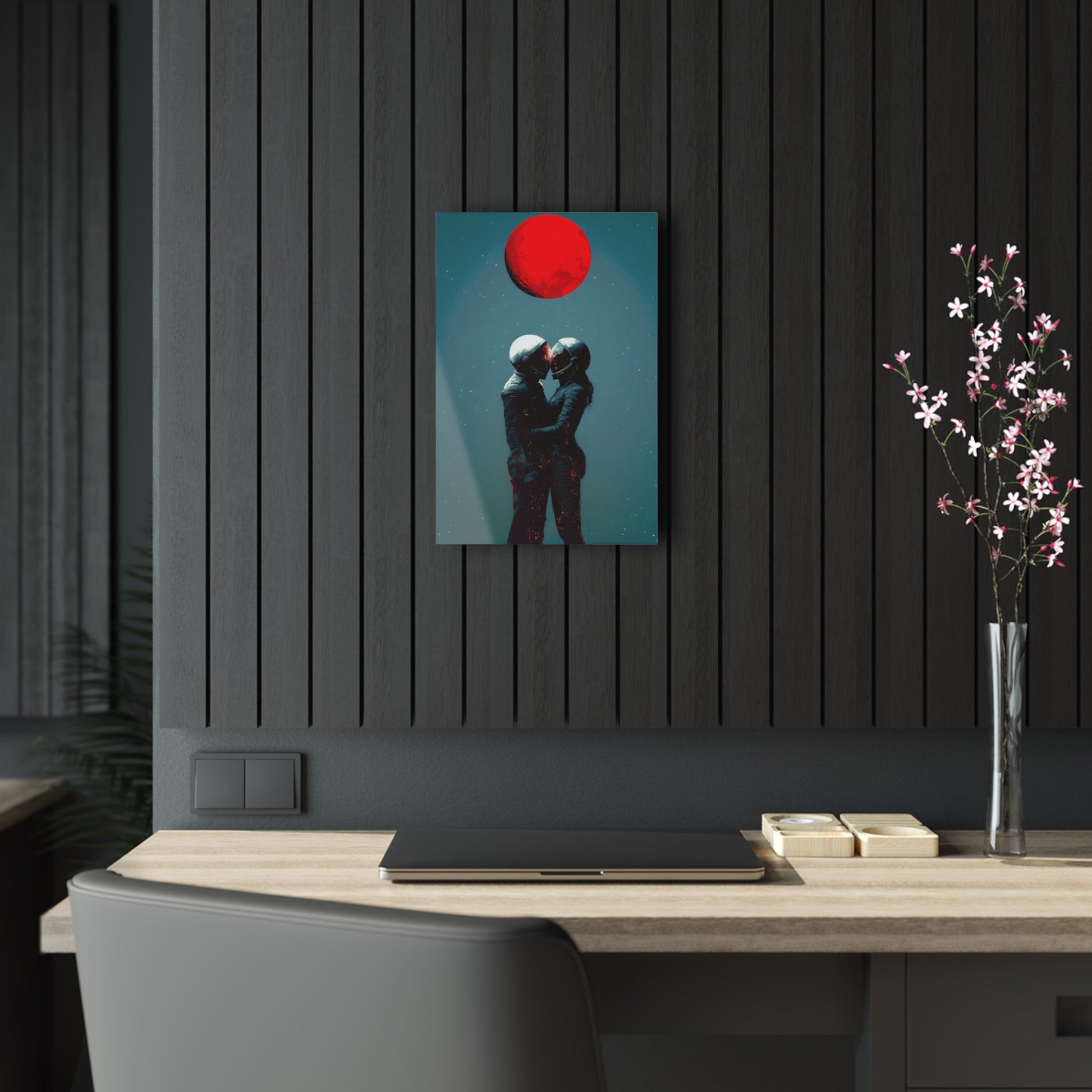 Vertical-oriented wall art: "Galactic Romance IV" depicts two astronauts embracing under a glowing red moon, their helmets gently touching as they share a moment of intimacy in space. The starry background contrasts with the fiery red moon, emphasizing the romantic and cosmic connection between the figures.