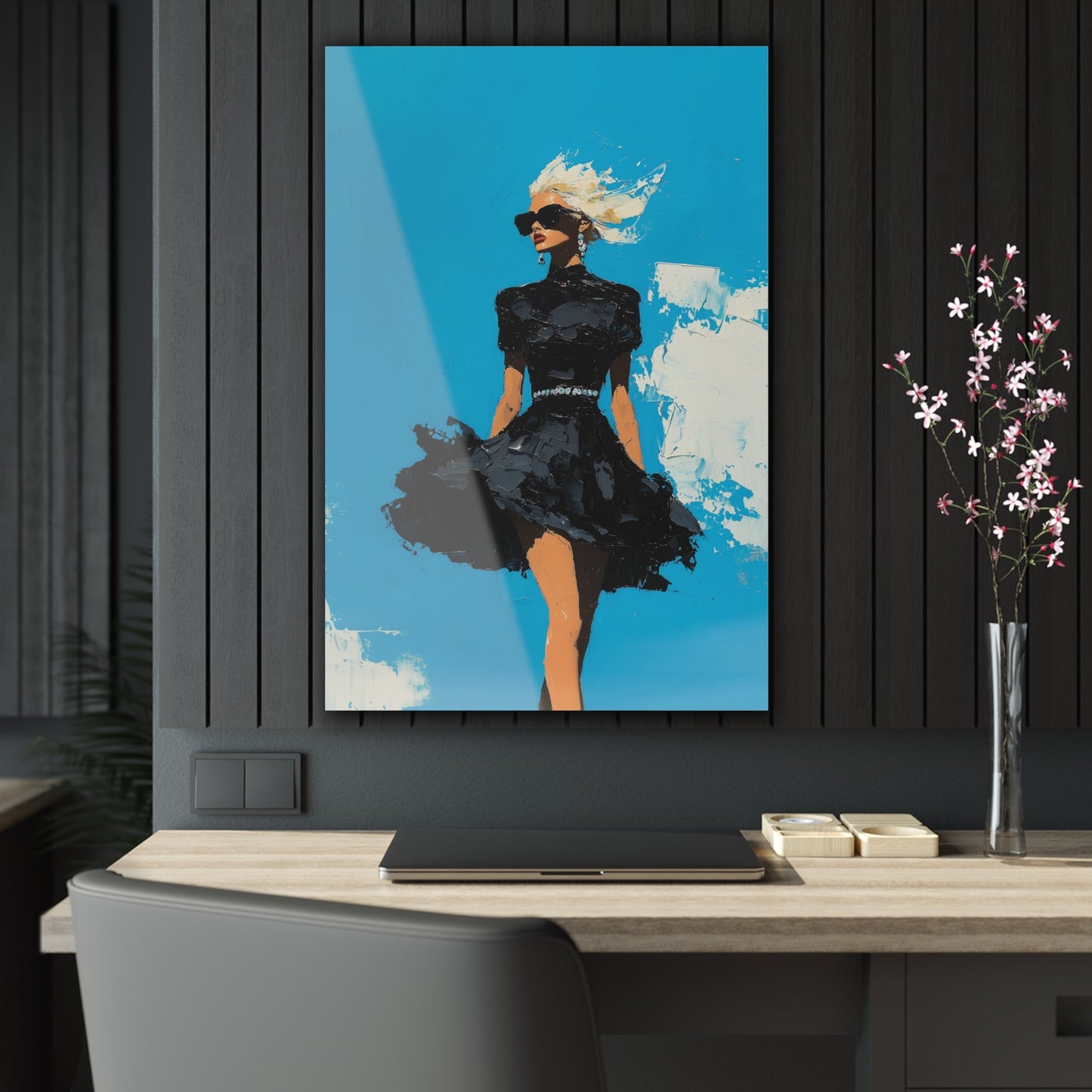 Vertical-oriented wall art: "Black Enigma II." A confident woman walks gracefully in a textured black dress, her wind-blown hair illuminated against a vibrant cerulean sky. The bold palette knife technique and striking contrasts emphasize empowerment and elegance.