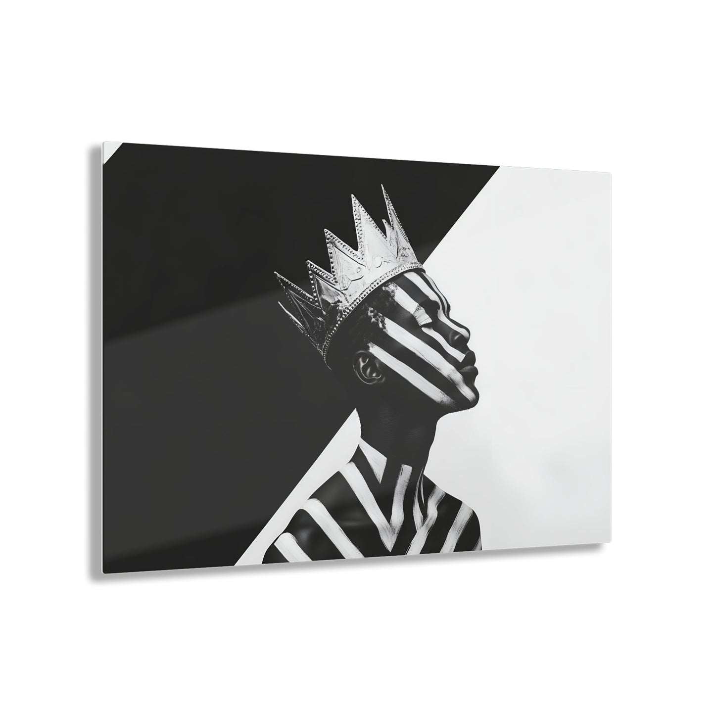 Horizontal-oriented wall art: "Crown of Dignity V" A black-and-white abstract portrait of a Black man wearing a metallic crown, his face and body adorned with bold, geometric stripes. The striking contrast and minimalist design emphasize his regal presence and dignified expression against a stark background.